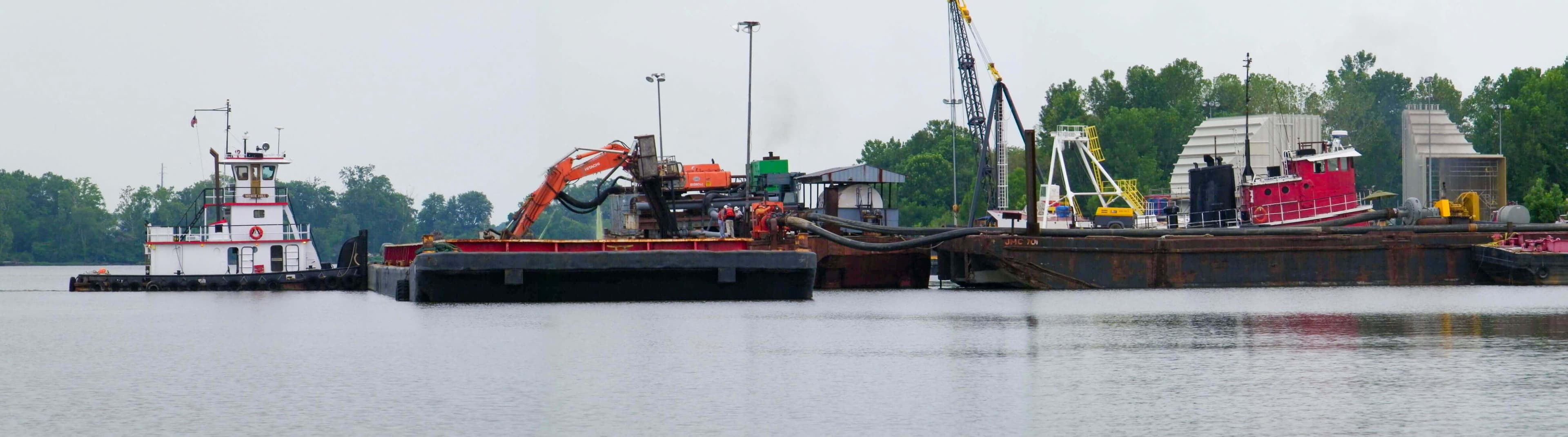Hydraulic offloading of dredged material at the Weanack dock
